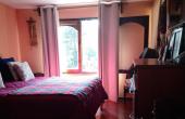 dormitorio principal con baño en suite, planta baja